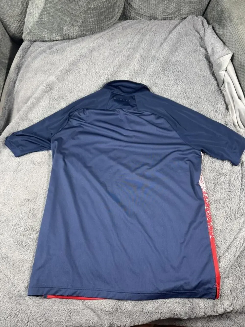 Oakley Golf Polo Shirt Mens 2XL Blue Red Splatter Print Short Sleeve Performance
